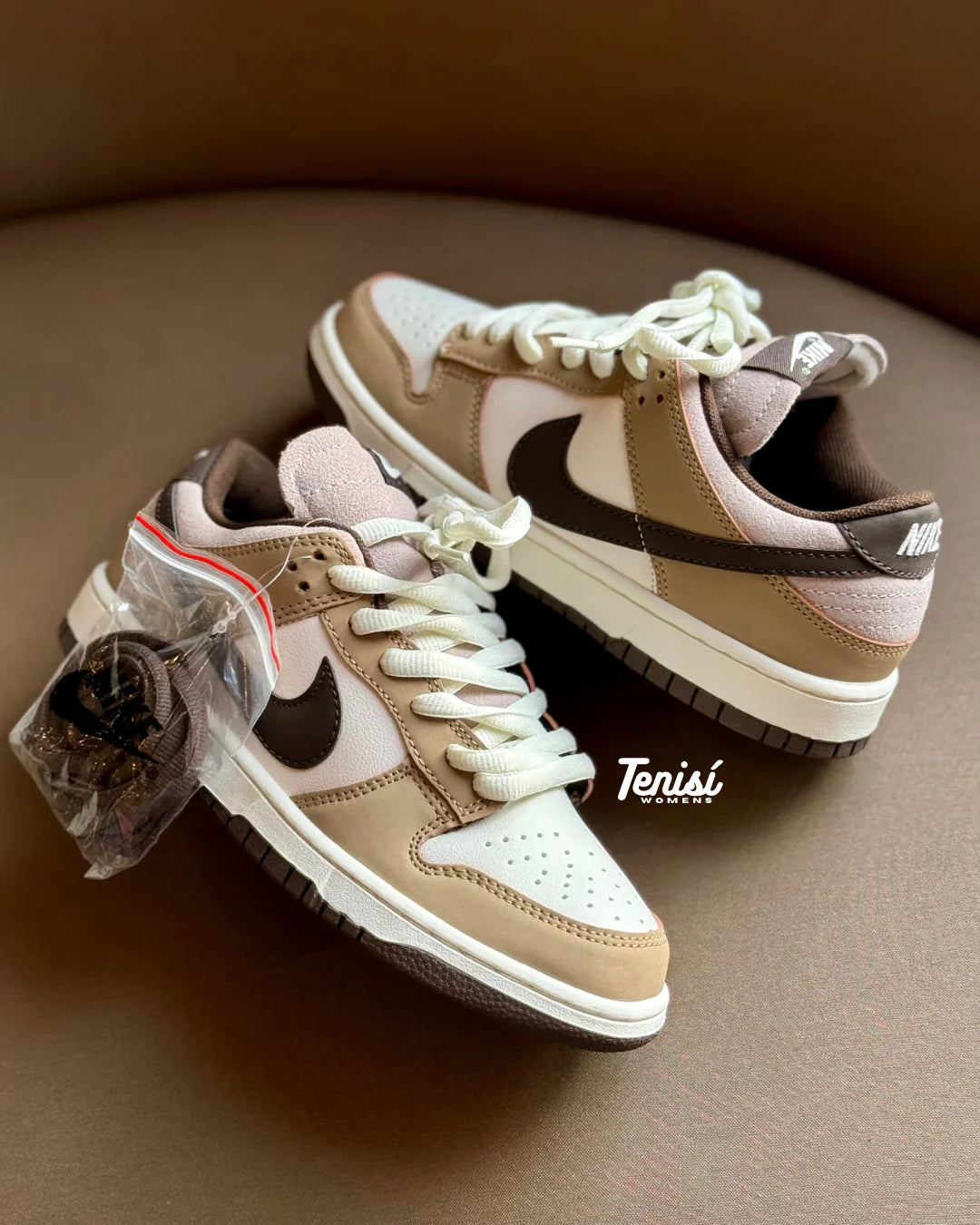 Nike (D)