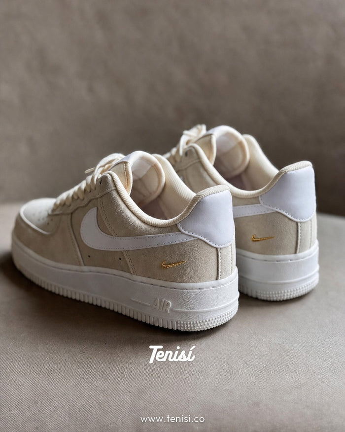 Nike Air Force 1 Low Beige Suede Gold Swoosh look 1