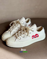 Converse x Comme des Garçons PLAY Chuck 70 vista 1