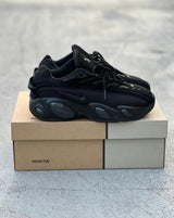 Nike Nocta Glide X Drake “Triple Black” vista 1