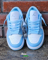 Air Jordan 1 Low “UNC” vista 2