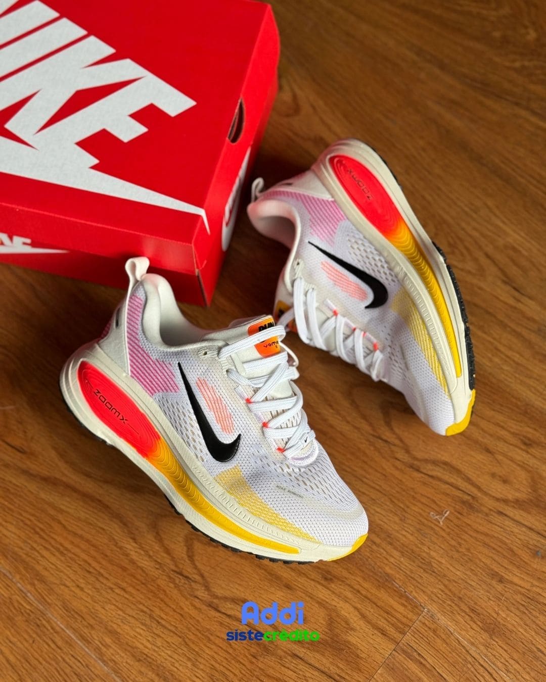 Tenis Nike Vomero 18 White/Orange vista frontal – envío gratis